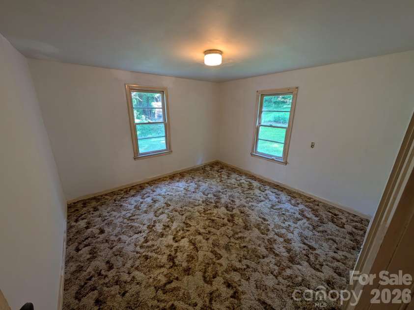 1327 NC 80 Highway, Bakersville, NC 28705.  MLS# CAR4392395, YatesRealty ID 34625. Bedroom 2 lower