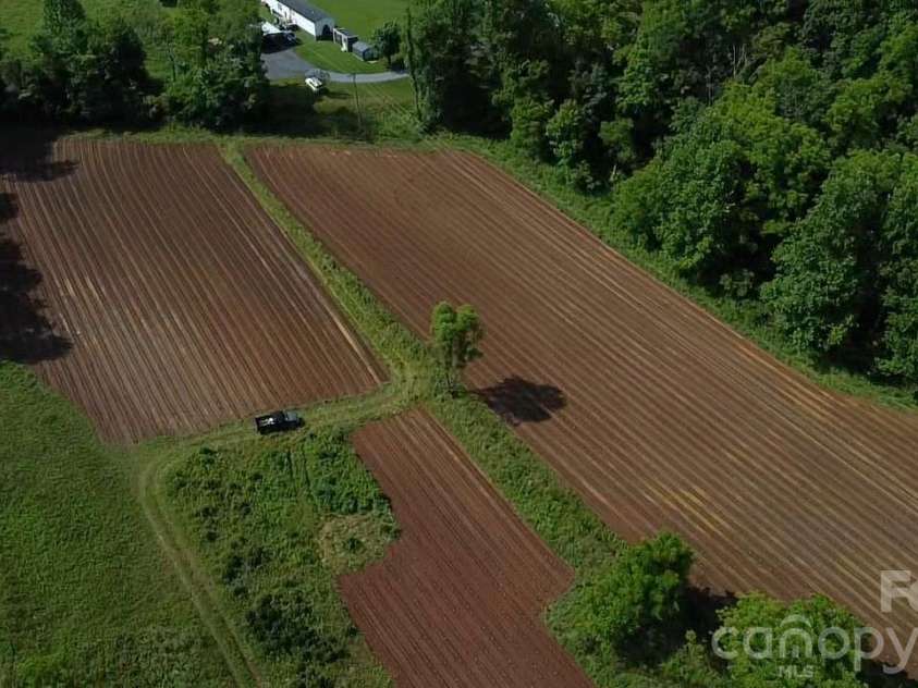 1327 NC 80 Highway, Bakersville, NC 28705.  MLS# CAR4392395, YatesRealty ID 34625. Lower fields