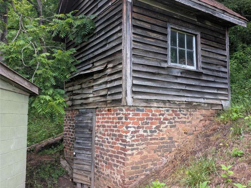 1327 NC 80 Highway, Bakersville, NC 28705.  MLS# CAR4392395, YatesRealty ID 34625. Root Cellar outbuilding 2