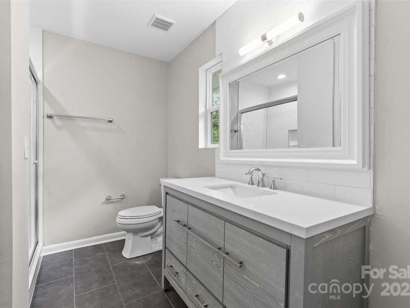 5017 Celeste Court, Charlotte, NC 28270.  MLS# CAR4289916, YatesRealty ID 34626. Bathroom Above Garage