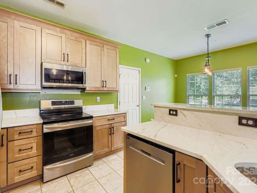 13408 Toka Court, Huntersville, NC 28078.  MLS# CAR4293402, YatesRealty ID 34633. Kitchen with Quartz Countertops