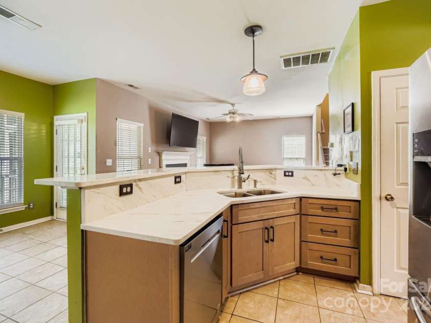13408 Toka Court, Huntersville, NC 28078.  MLS# CAR4293402, YatesRealty ID 34633. Kitchen with Tile Flooring