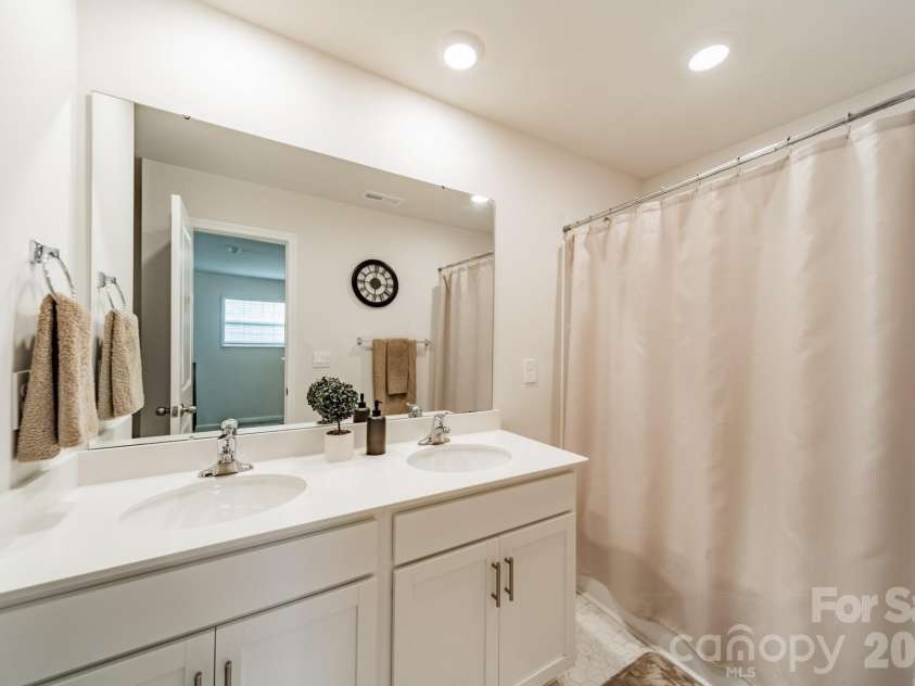 3629 Azalea Ridge Drive, Mount Holly, NC 28120.  MLS# CAR4399386, YatesRealty ID 34636. Hall Bath with dual sinks