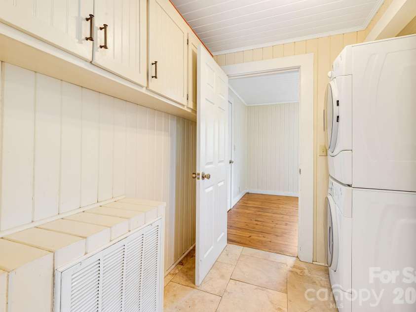 111 Bible School Road, Lake Lure, NC 28746.  MLS# CAR4399262, YatesRealty ID 34637. Laundry room shelving