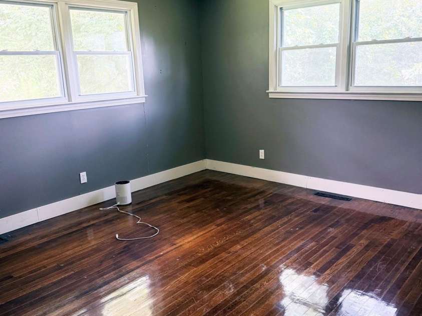 1556 Sam Smith Road, Fort Mill, SC 29708.  MLS# CAR4279108, YatesRealty ID 34638. Large bedroom with hardwood floors