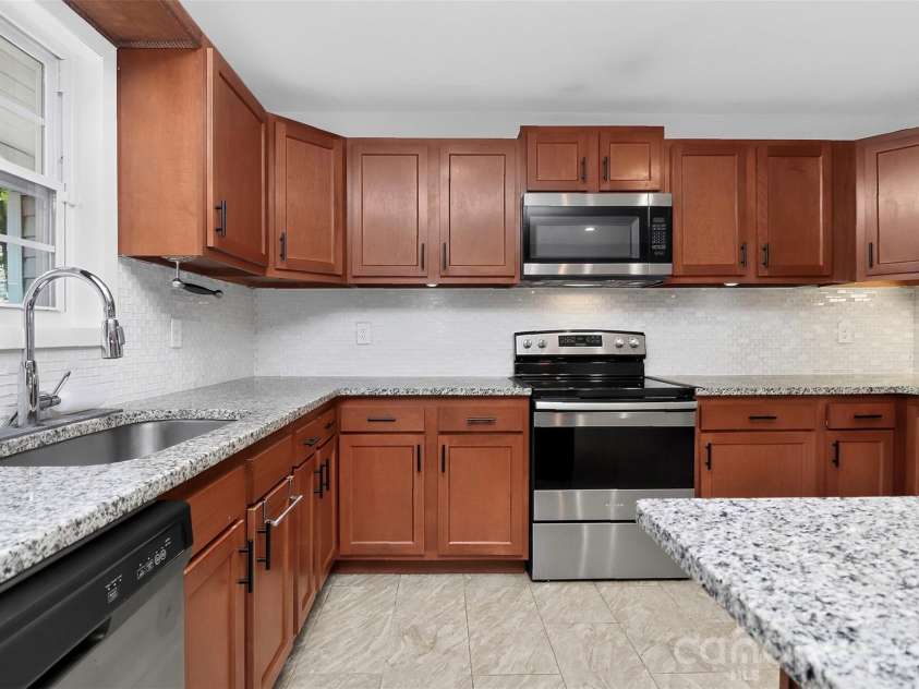 704 Lancaster Avenue, Monroe, NC 28112.  MLS# CAR4399672, YatesRealty ID 34639. 