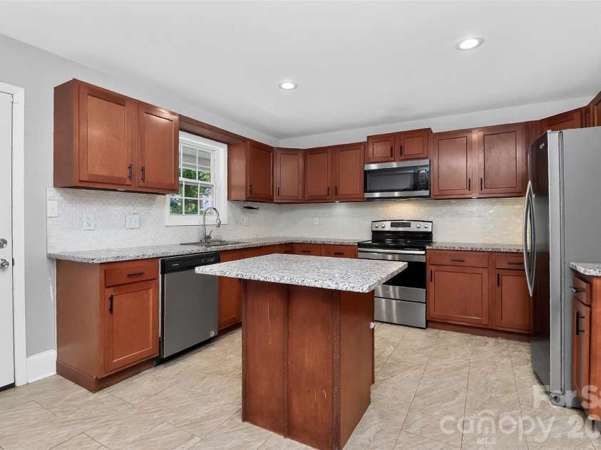 704 Lancaster Avenue, Monroe, NC 28112.  MLS# CAR4399672, YatesRealty ID 34639. 