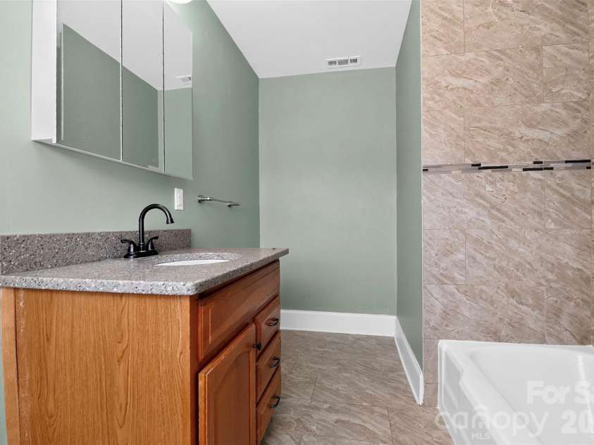 704 Lancaster Avenue, Monroe, NC 28112.  MLS# CAR4399672, YatesRealty ID 34639. 