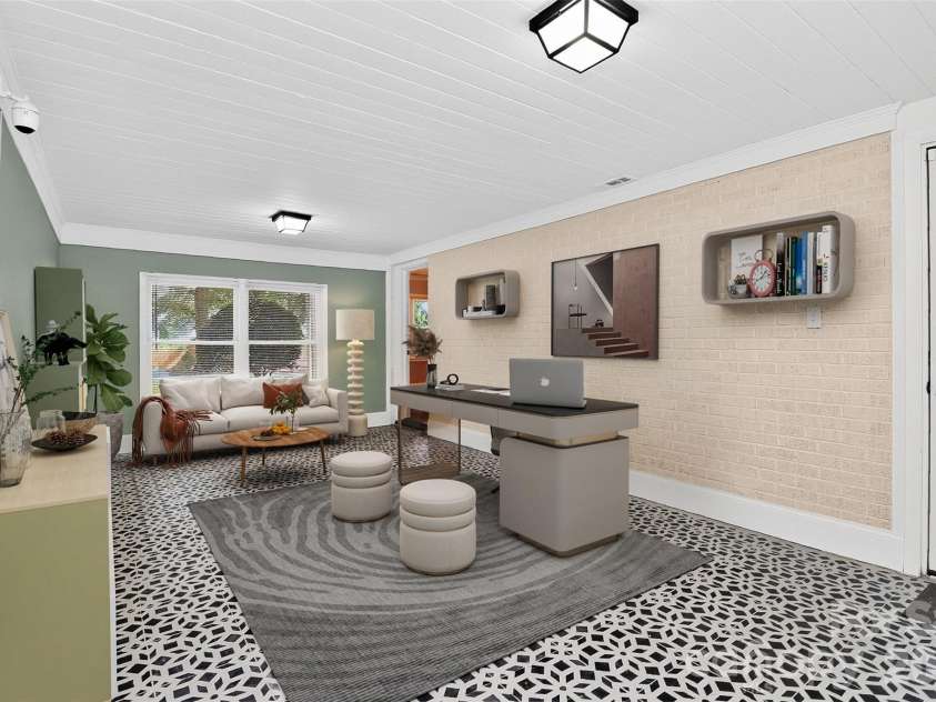 704 Lancaster Avenue, Monroe, NC 28112.  MLS# CAR4399672, YatesRealty ID 34639. Virtually Staged