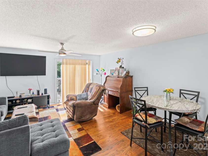 9614 Green Gable Court, Charlotte, NC 28270.  MLS# CAR4294341, YatesRealty ID 34640. Living room, with dining area