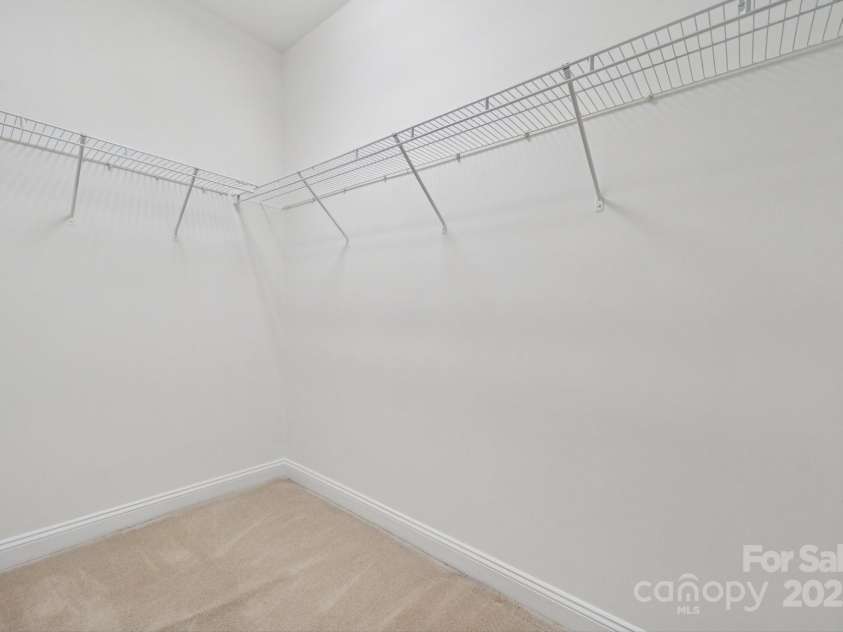 10011 Bishops Gate Boulevard, Pineville, NC 28134.  MLS# CAR4334475, YatesRealty ID 34641. Primary walk in closet