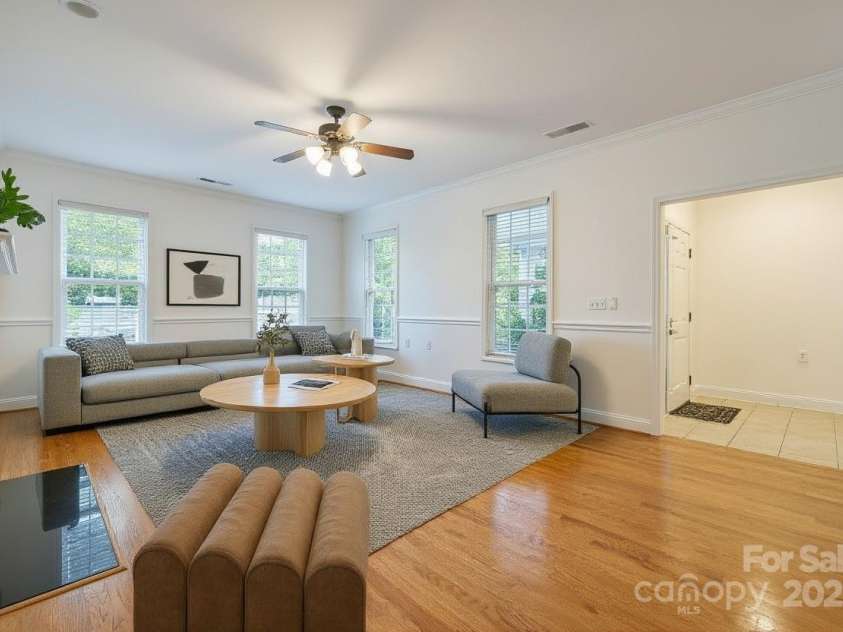 10011 Bishops Gate Boulevard, Pineville, NC 28134.  MLS# CAR4334475, YatesRealty ID 34641. Virtually Staged living room