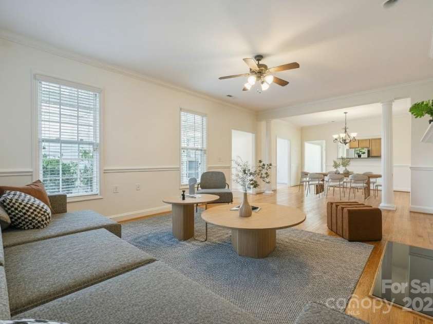 10011 Bishops Gate Boulevard, Pineville, NC 28134.  MLS# CAR4334475, YatesRealty ID 34641. Virtually Staged living room