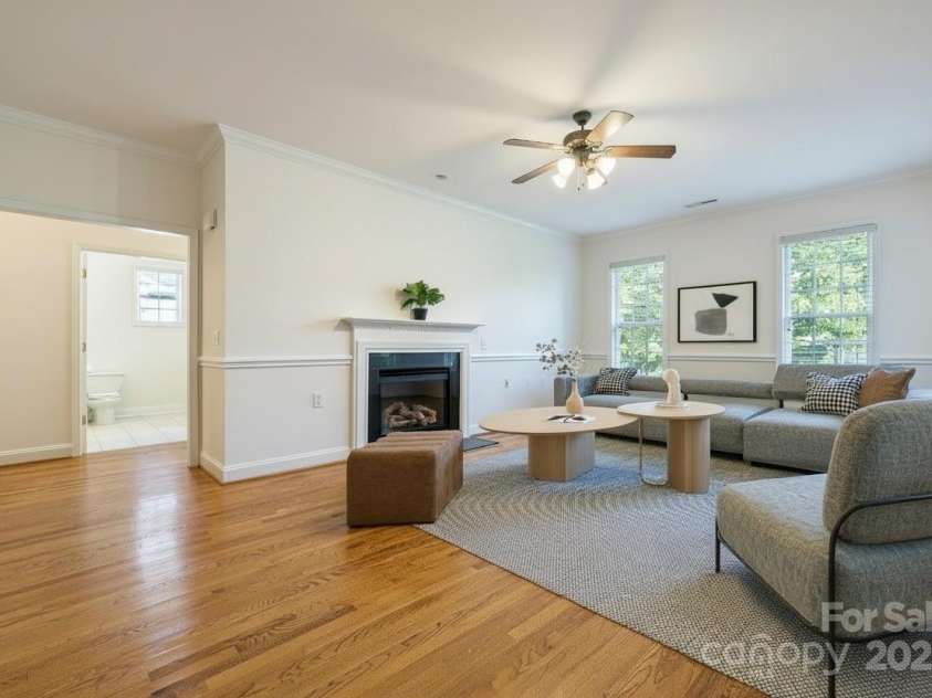 10011 Bishops Gate Boulevard, Pineville, NC 28134.  MLS# CAR4334475, YatesRealty ID 34641. Virtually Staged living room