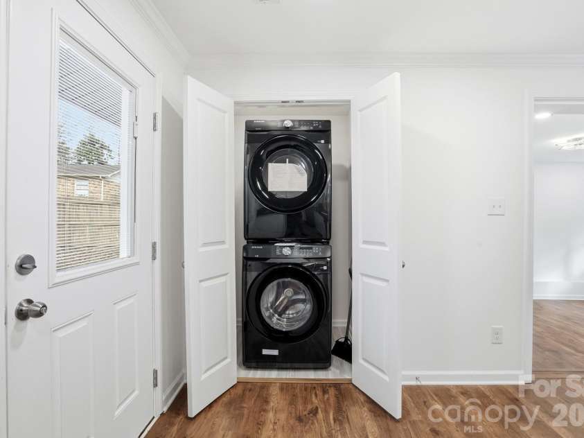 704 Border Street, Dallas, NC 28034.  MLS# CAR4342695, YatesRealty ID 3465. Laundry Closet right off Kitchen