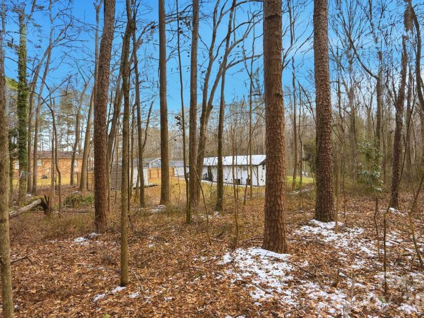 704 Border Street, Dallas, NC 28034.  MLS# CAR4342695, YatesRealty ID 3465. Subject backs to Wooded Vacant lots