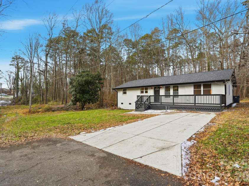 704 Border Street, Dallas, NC 28034.  MLS# CAR4342695, YatesRealty ID 3465. Subject Street currently dead ends at the subject property photo confirms what surround subject from front view