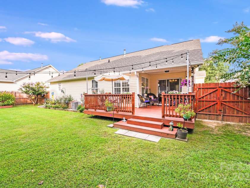 3319 Creek Trail Road, Indian Trail, NC 28079.  MLS# CAR4295633, YatesRealty ID 34657. Beautiful deck with installed lights that will remain! Ready for entertaining!