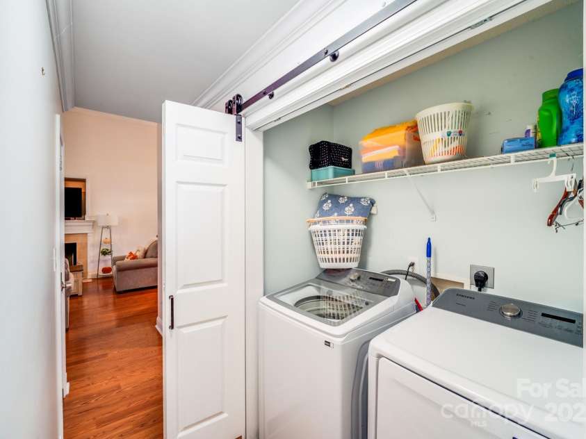 3319 Creek Trail Road, Indian Trail, NC 28079.  MLS# CAR4295633, YatesRealty ID 34657. Laundry closet with sliding barn doors