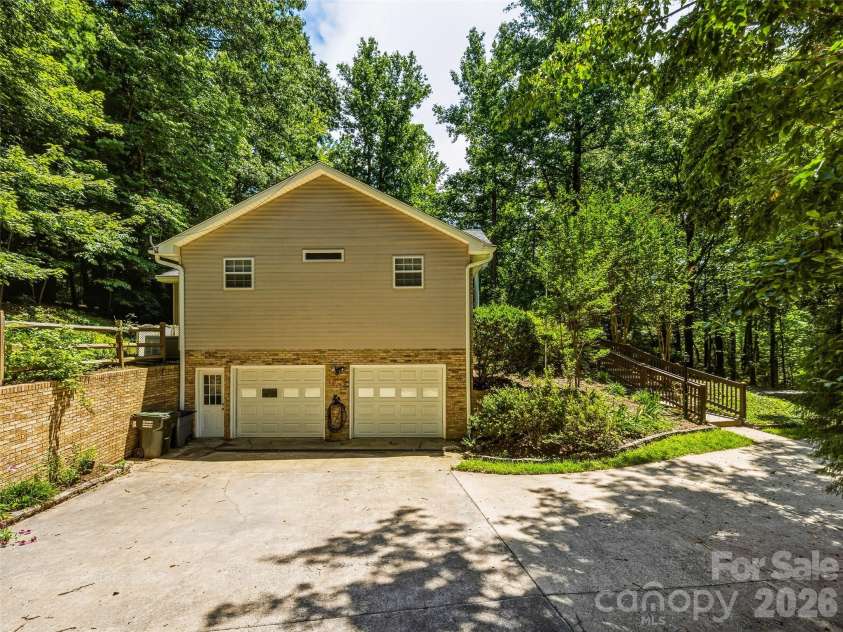 206 Camellia Way, Laurel Park, NC 28739.  MLS# CAR4398729, YatesRealty ID 34662. Attached garage on lower level