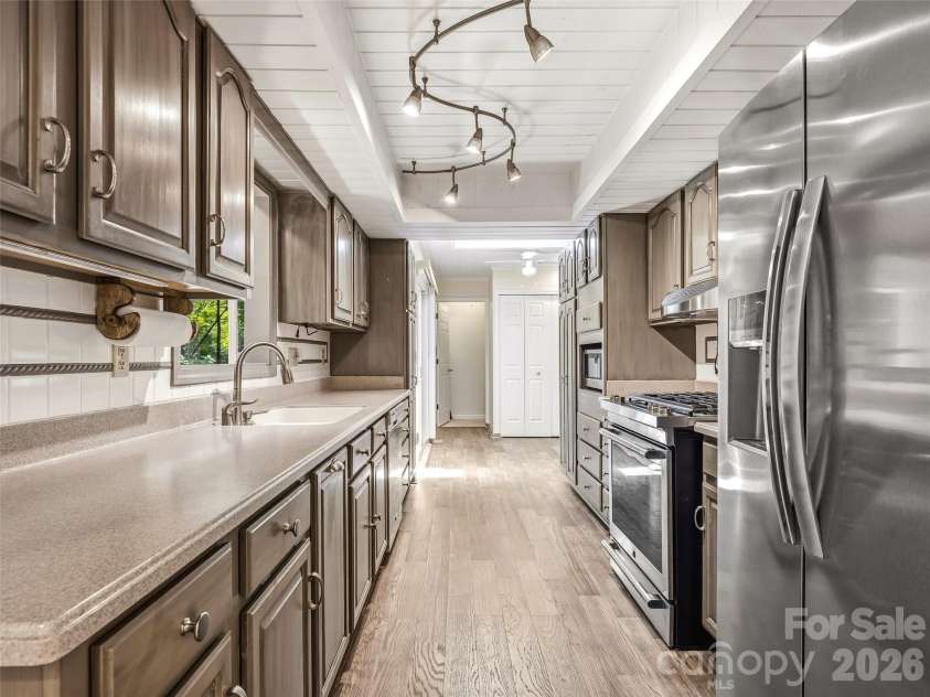 206 Camellia Way, Laurel Park, NC 28739.  MLS# CAR4398729, YatesRealty ID 34662. Galley Kitchen