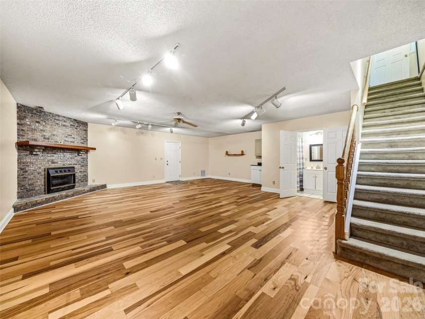 206 Camellia Way, Laurel Park, NC 28739.  MLS# CAR4398729, YatesRealty ID 34662. Lower level-fully finished with full bath and small kitchen sink