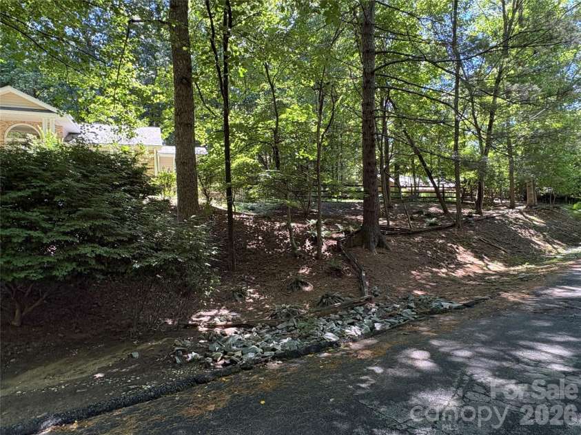 206 Camellia Way, Laurel Park, NC 28739.  MLS# CAR4398729, YatesRealty ID 34662. Private corner lot