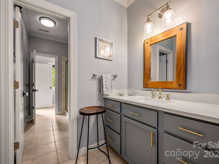 184 Duncan Estate Drive, Fletcher, NC 28732.  MLS# CAR4294135, YatesRealty ID 34666. Jack and Jill bathroom between bedroom 2 and 3