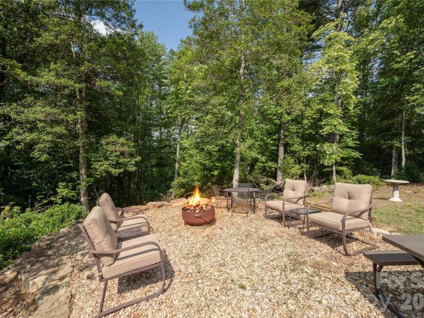 59 Smalltown Trail, Brevard, NC 28712.  MLS# CAR4399123, YatesRealty ID 34667. Fire pit