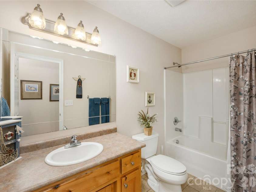 59 Smalltown Trail, Brevard, NC 28712.  MLS# CAR4399123, YatesRealty ID 34667. Guest Bathroom