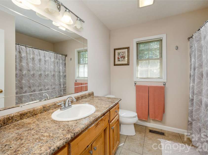 59 Smalltown Trail, Brevard, NC 28712.  MLS# CAR4399123, YatesRealty ID 34667. Primary Ensuite