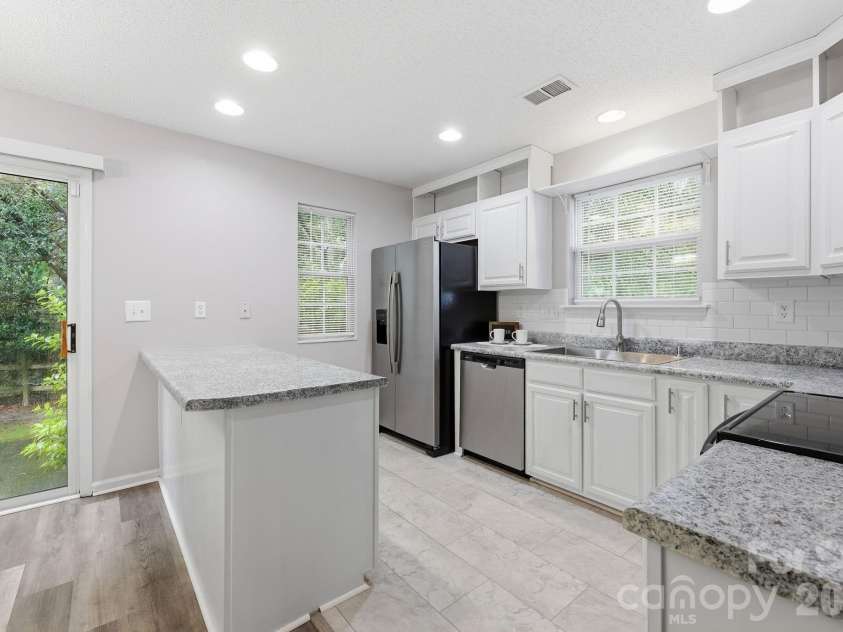 8230 Rudolph Road, Charlotte, NC 28216.  MLS# CAR4389639, YatesRealty ID 3468. 