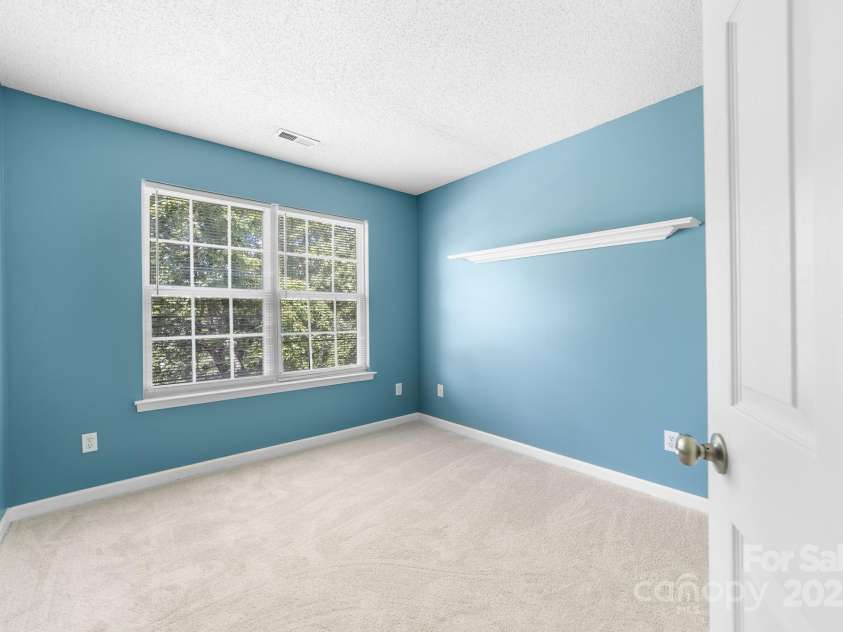10422 Baskerville Avenue, Charlotte, NC 28269.  MLS# CAR4294892, YatesRealty ID 34680. Secondary bedroom