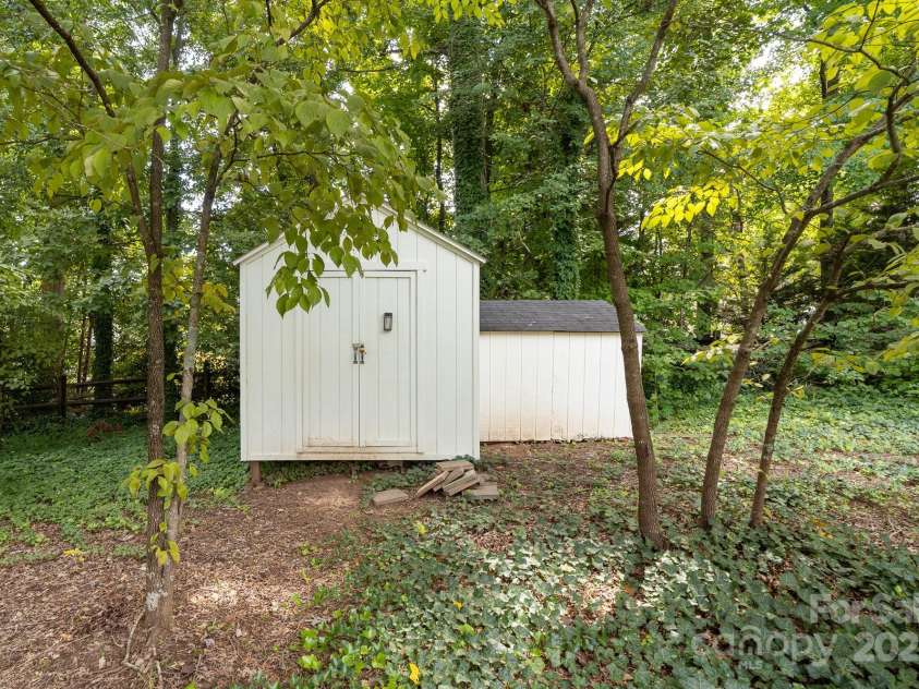 10422 Baskerville Avenue, Charlotte, NC 28269.  MLS# CAR4294892, YatesRealty ID 34680. Storage shed