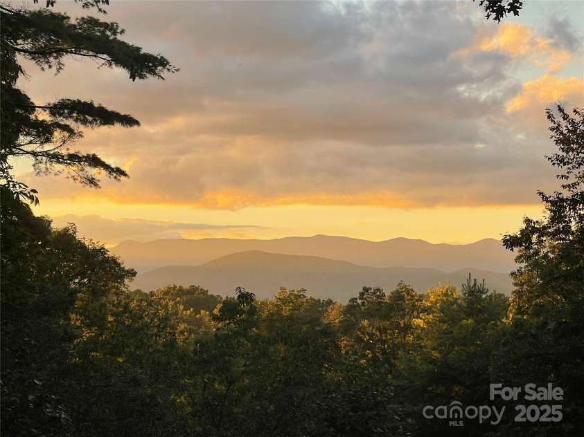 219 Kentwood Lane, Pisgah Forest, NC 28768.  MLS# CAR4293191, YatesRealty ID 34681. Back porch view