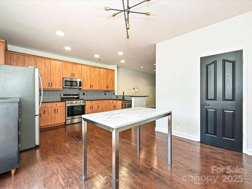 1035 Market Street, Fort Mill, SC 29708.  MLS# CAR4294533, YatesRealty ID 34682. Kitchen and Dining Space