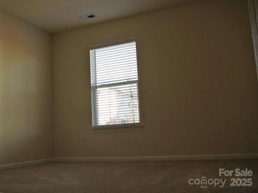13008 Rothe House Road, Charlotte, NC 28273.  MLS# CAR4296922, YatesRealty ID 34685. Back corner bedroom11'2