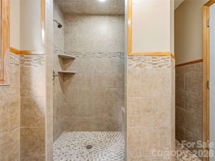 1856 Lickskillet Road, Burnsville, NC 28714.  MLS# CAR4396604, YatesRealty ID 34698. Guest home bathroom