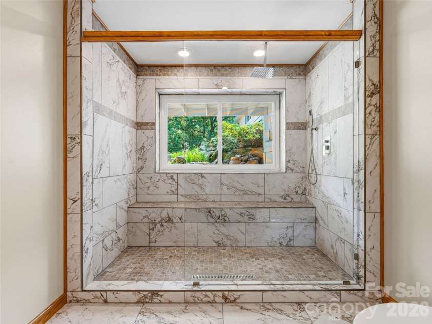 1856 Lickskillet Road, Burnsville, NC 28714.  MLS# CAR4396604, YatesRealty ID 34698. Lower floor bathroom