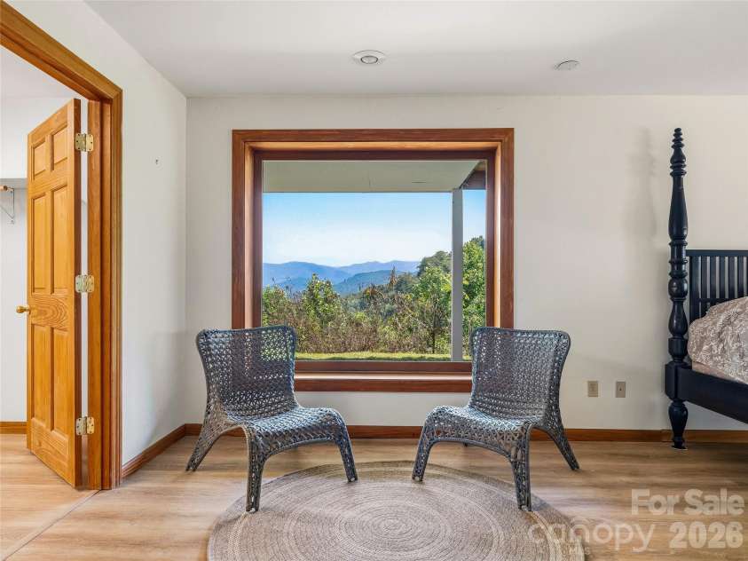 1856 Lickskillet Road, Burnsville, NC 28714.  MLS# CAR4396604, YatesRealty ID 34698. Lower floor bedroom