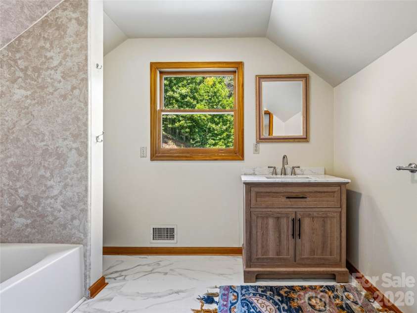 1856 Lickskillet Road, Burnsville, NC 28714.  MLS# CAR4396604, YatesRealty ID 34698. Upper floor bathroom