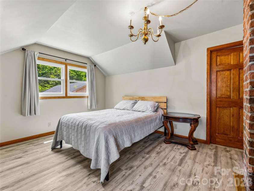 1856 Lickskillet Road, Burnsville, NC 28714.  MLS# CAR4396604, YatesRealty ID 34698. Upper floor bedroom