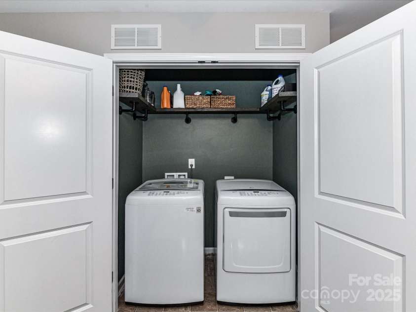 355 Pulaski Drive, Concord, NC 28027.  MLS# CAR4287941, YatesRealty ID 34699. Laundry off of Loft