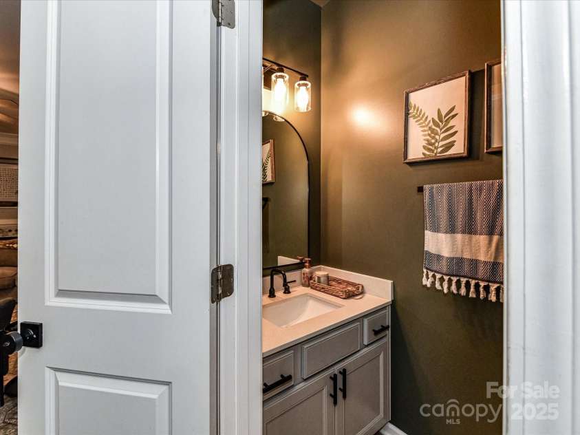355 Pulaski Drive, Concord, NC 28027.  MLS# CAR4287941, YatesRealty ID 34699. Powder Room on Main Floor