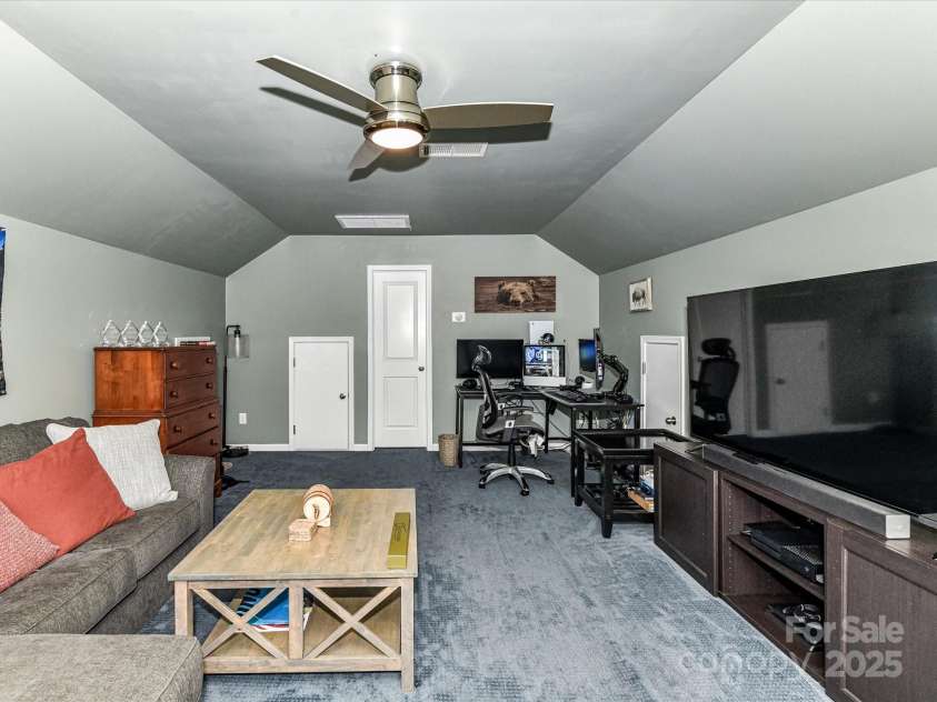 355 Pulaski Drive, Concord, NC 28027.  MLS# CAR4287941, YatesRealty ID 34699. Third Story. Great for Office Space or Movie Room