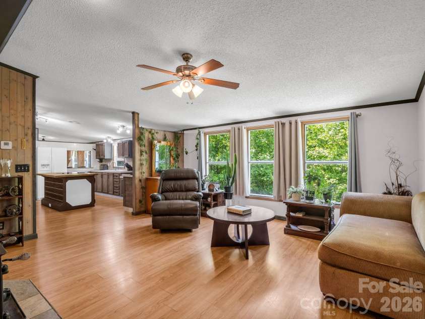 2053 Nancy Mountain Road, Rosman, NC 28772.  MLS# CAR4381811, YatesRealty ID 347. Den into Kitchen