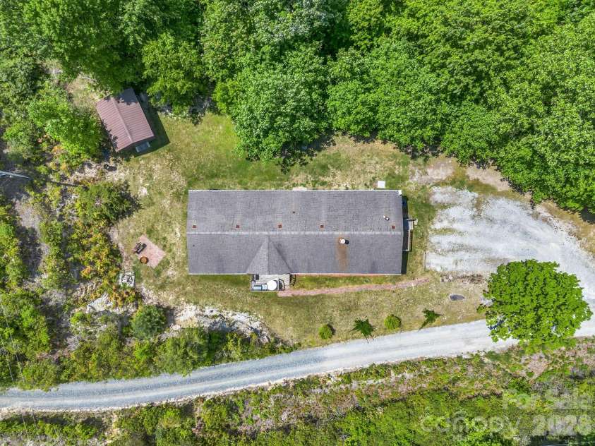 2053 Nancy Mountain Road, Rosman, NC 28772.  MLS# CAR4381811, YatesRealty ID 347. Drone over home and property