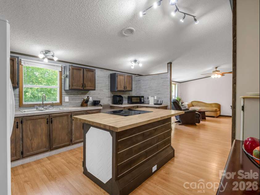 2053 Nancy Mountain Road, Rosman, NC 28772.  MLS# CAR4381811, YatesRealty ID 347. Kitchen from front living room