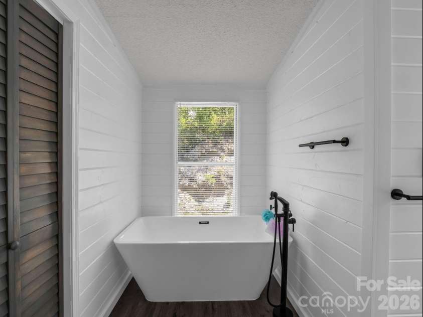 2053 Nancy Mountain Road, Rosman, NC 28772.  MLS# CAR4381811, YatesRealty ID 347. Primary bath with sitting tub