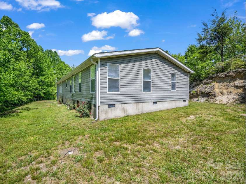 2053 Nancy Mountain Road, Rosman, NC 28772.  MLS# CAR4381811, YatesRealty ID 347. Side and back